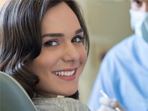 close up of woman smiling in dental chair